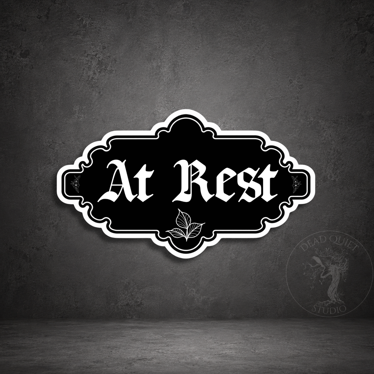 At Rest gothic sticker with blackletter typography, botanical details and ornate vintage frame